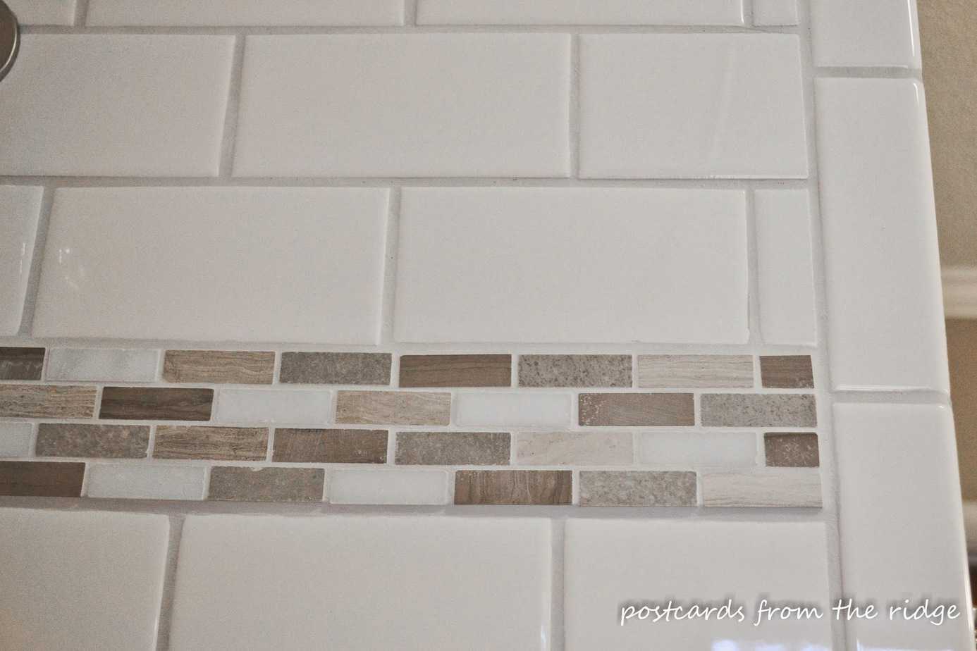 I love this accent tile!  Lots of other great bathroom ideas here!