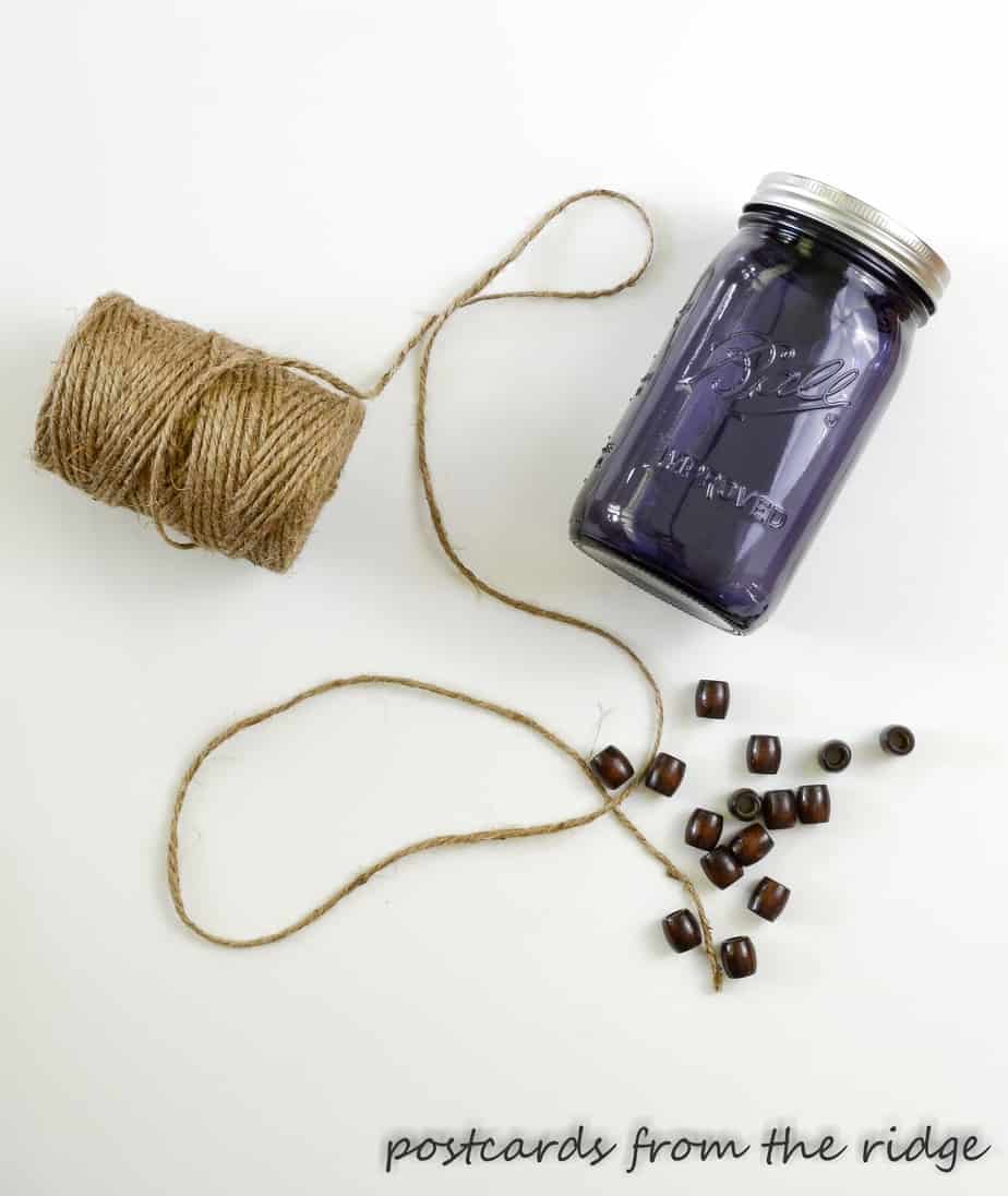 twine, wood beads, and a purple mason jar
