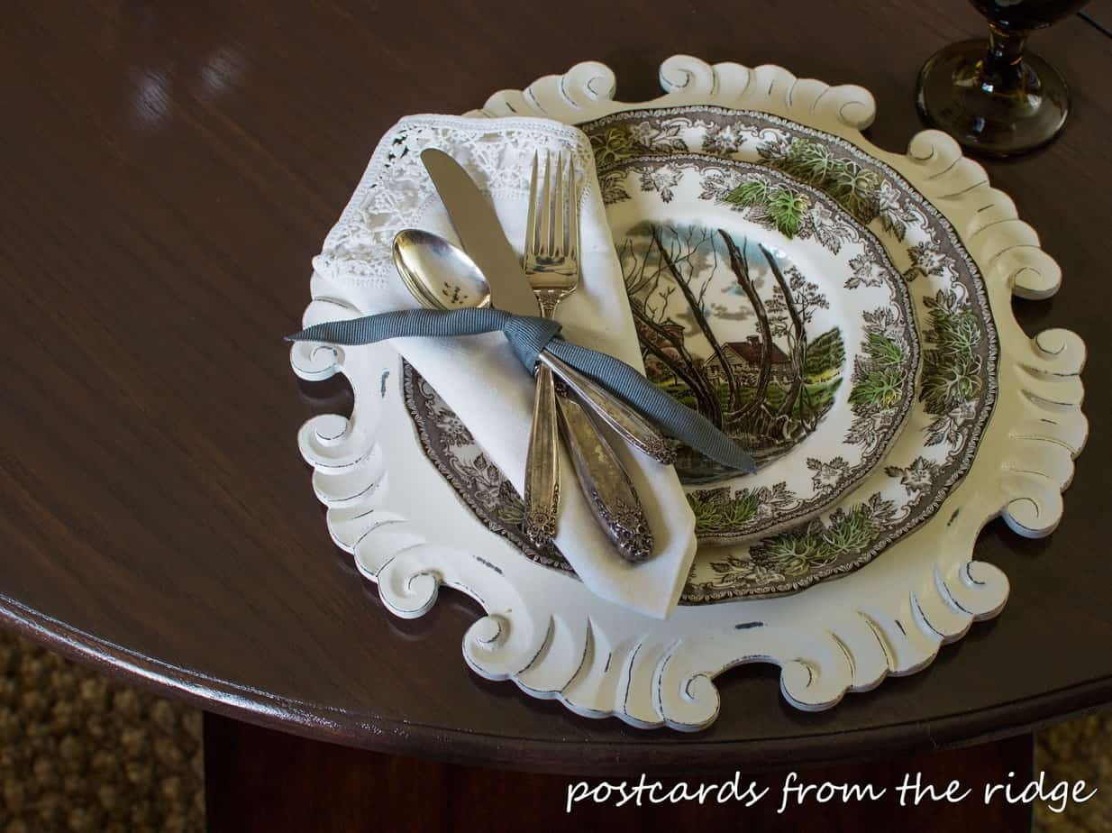 Vintage silverware and linens paired with brown transferware.