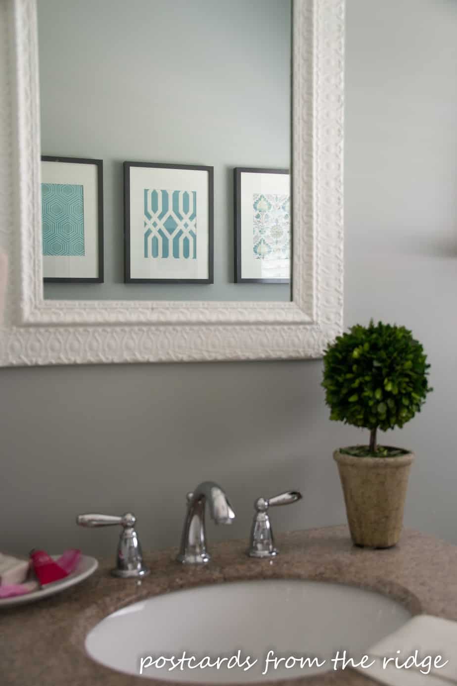 White Vintage Mirror, DIY Artwork, Boxwood Topiary in the Bathroom. Postcards from the Ridge.