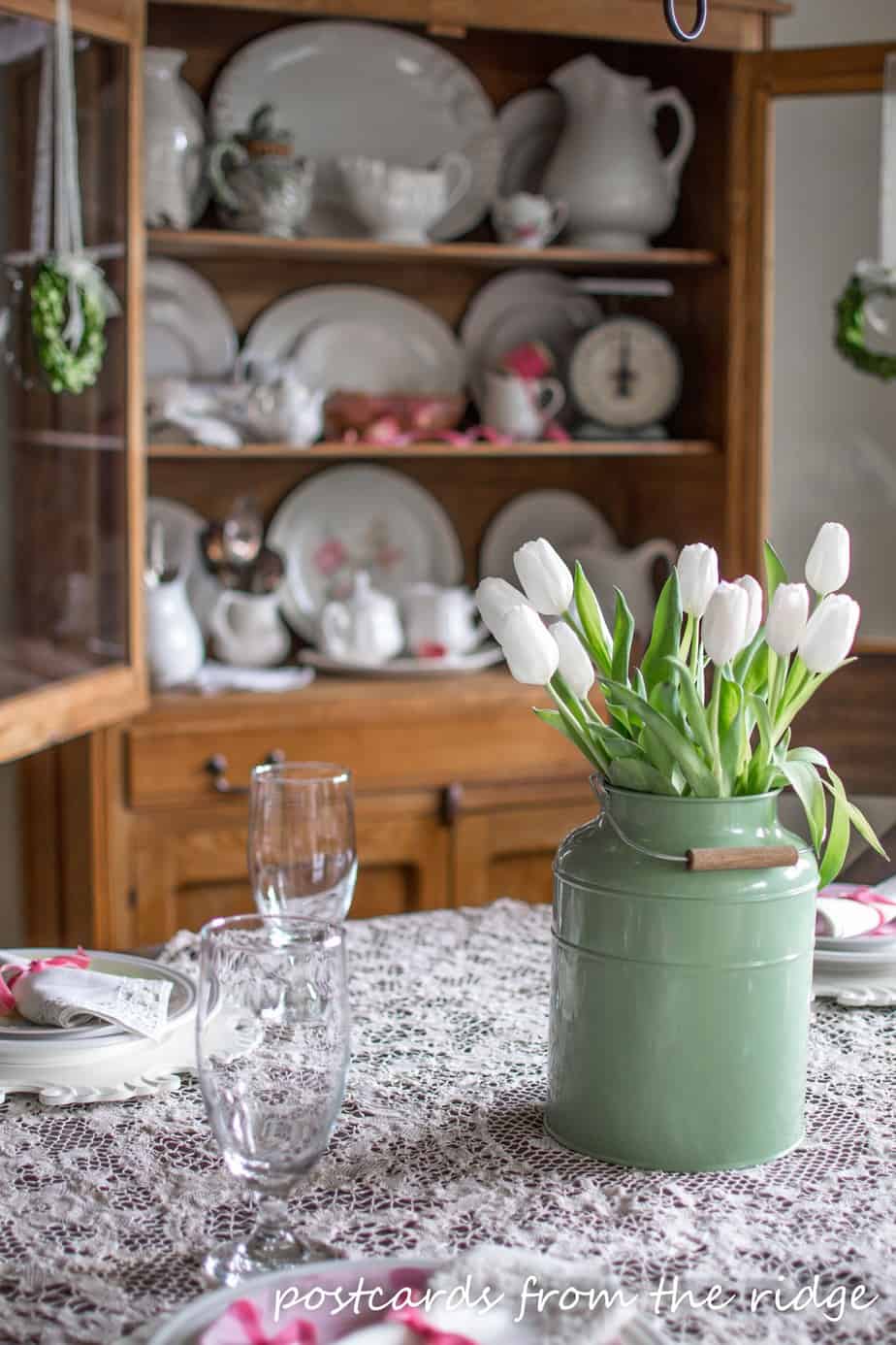 Using vintage finds and fresh white tulips for a spring table. 
