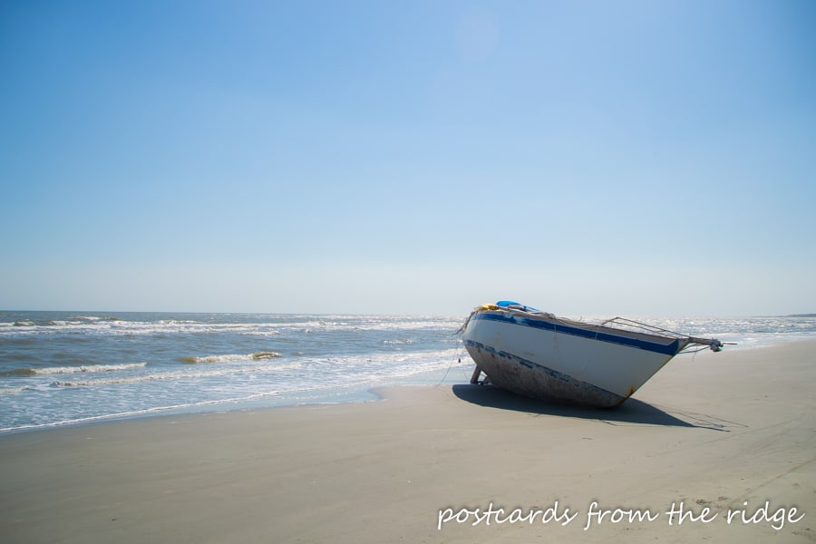 boat washed up on the shore at kiawah island, sc
