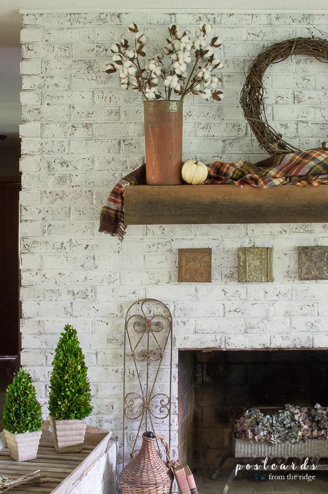 Lots of charming ways to add French farmhouse decor to your fall fireplace.