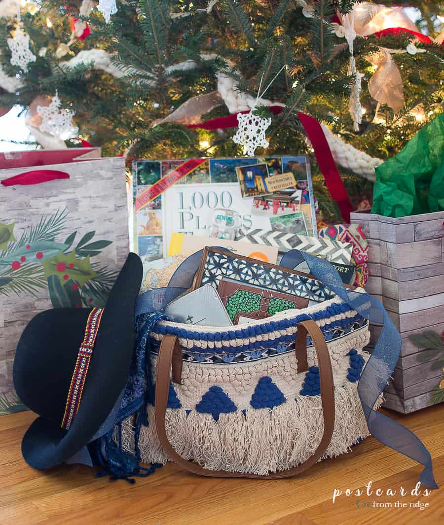 Blue fringed boho bag full of gift ideas for travelers