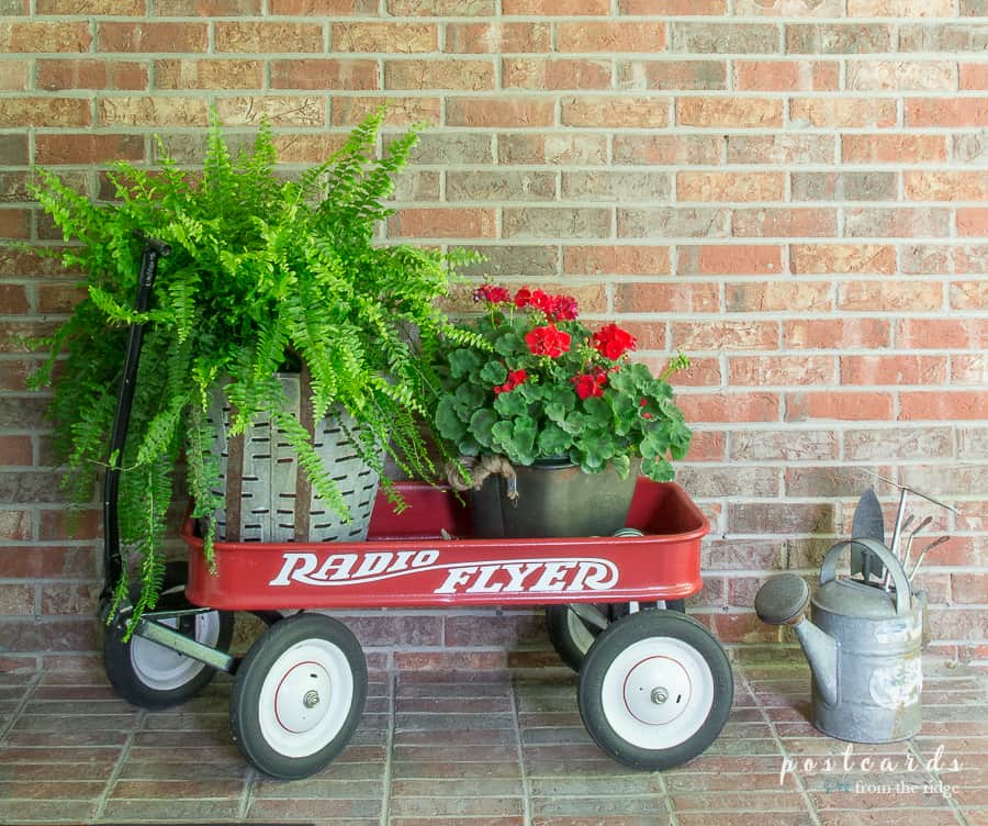 vintage radio flyer red wagon with summer flowers