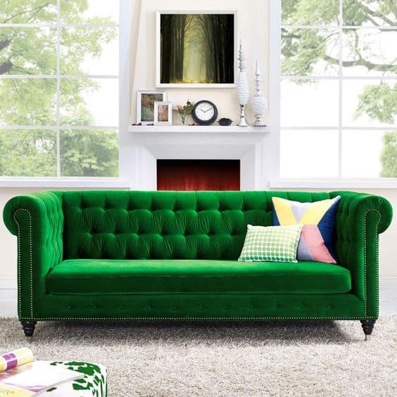 green velvet tufted sofa