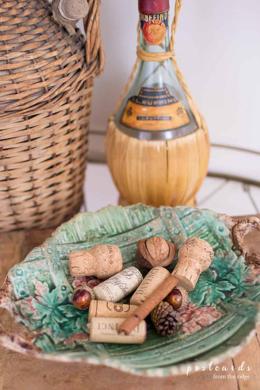 old green dish with wine corks