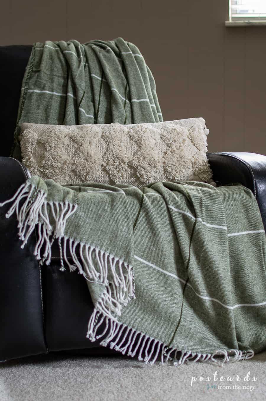 soft textured pillow and cozy throw blanket