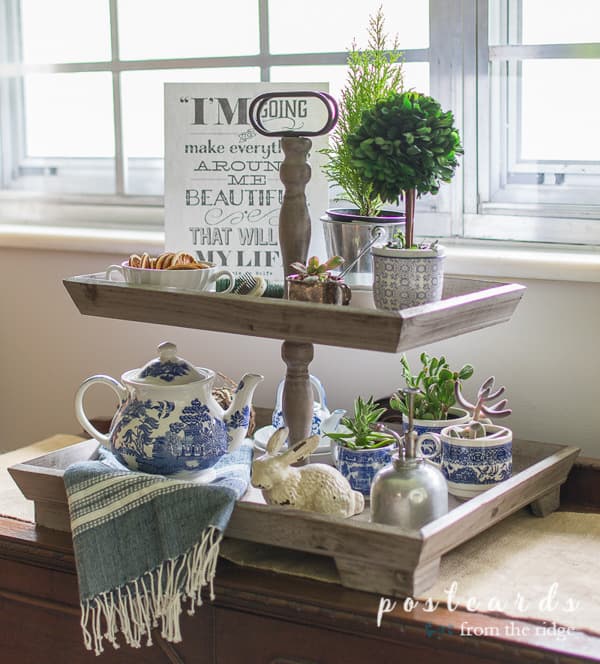 2 tiered wooden tray with blue and whtie decor