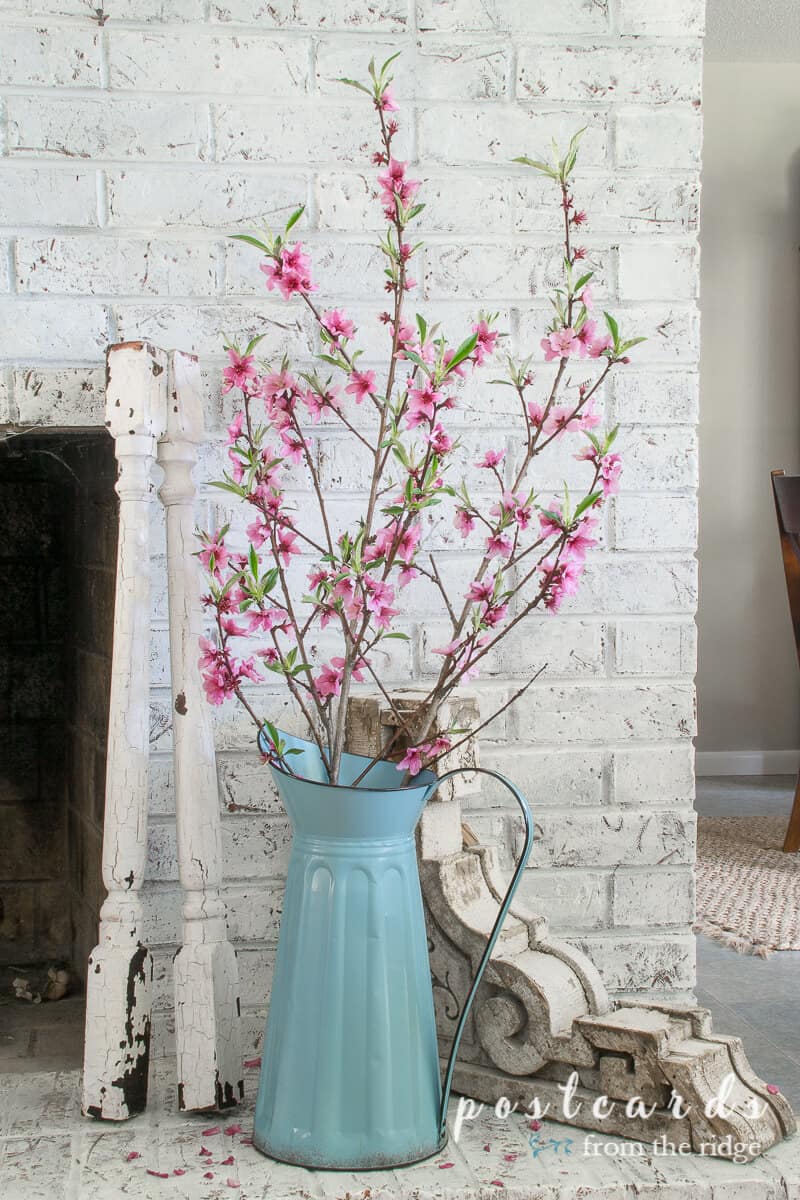 Spring Mantel With Flowers and Vintage Finds