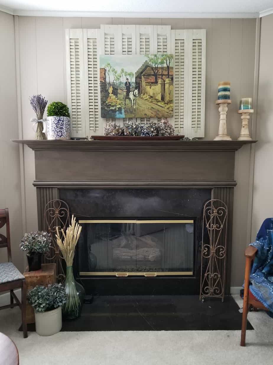 brown and black fireplace mantel
