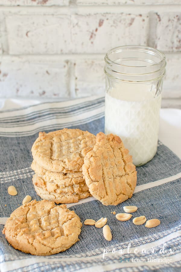 homemade peanut butter cookies and a jelly jar full of milk