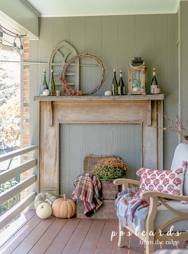 rustic vintage farmhouse mantel used on deck with rustic fall decor
