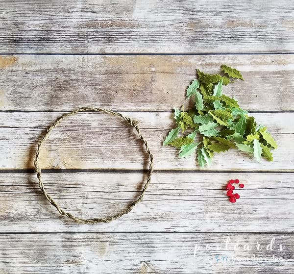 wire wreath form with felt holly leaves and berries