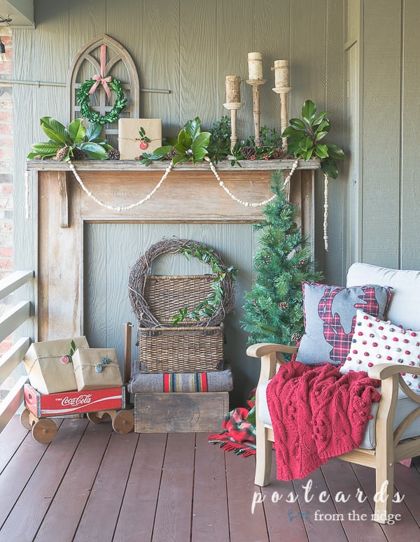outdoor mantel with Christmas decorations