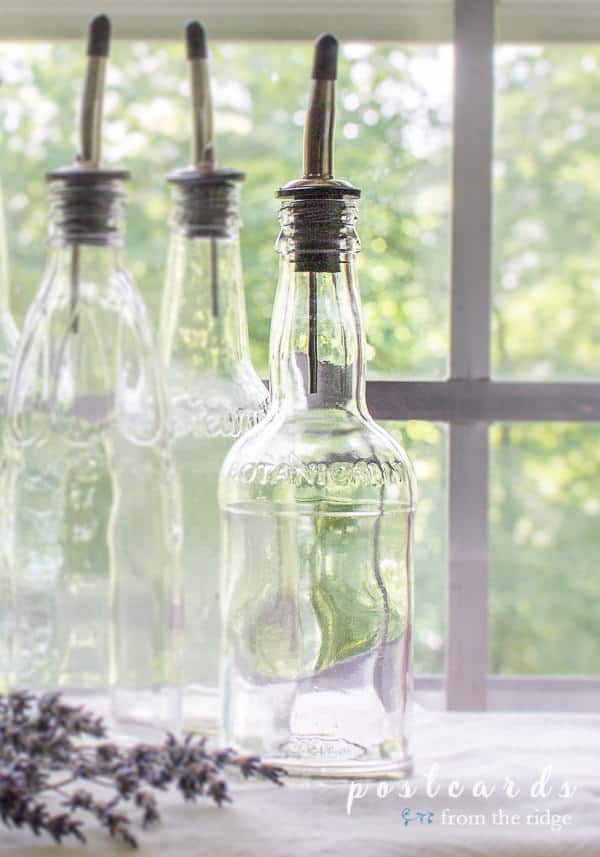 glass bottle with dispenser spout