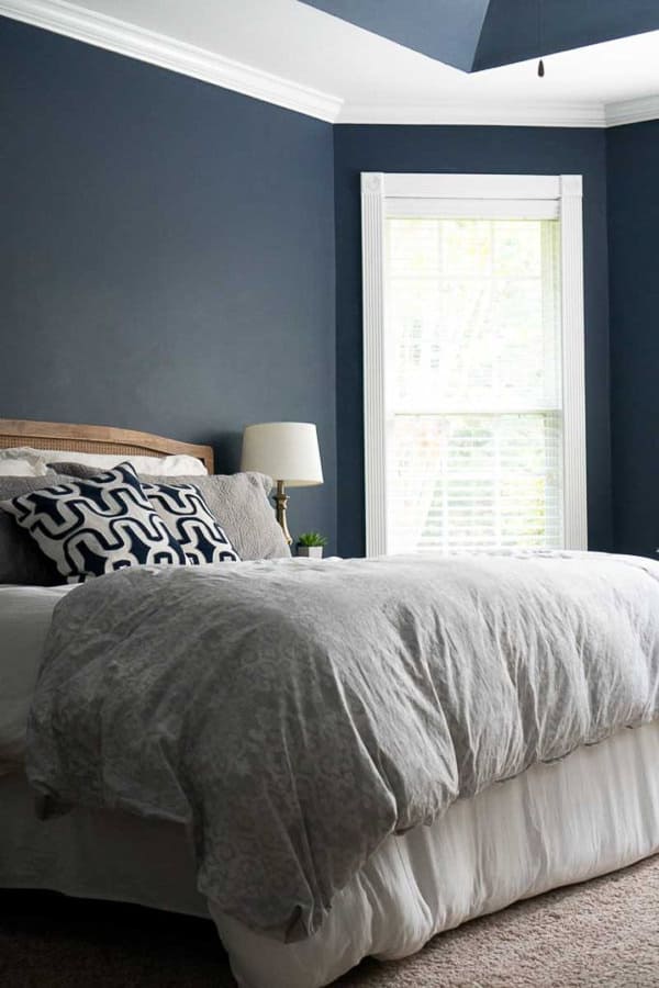 bedroom with Sherwin Williams Naval walls