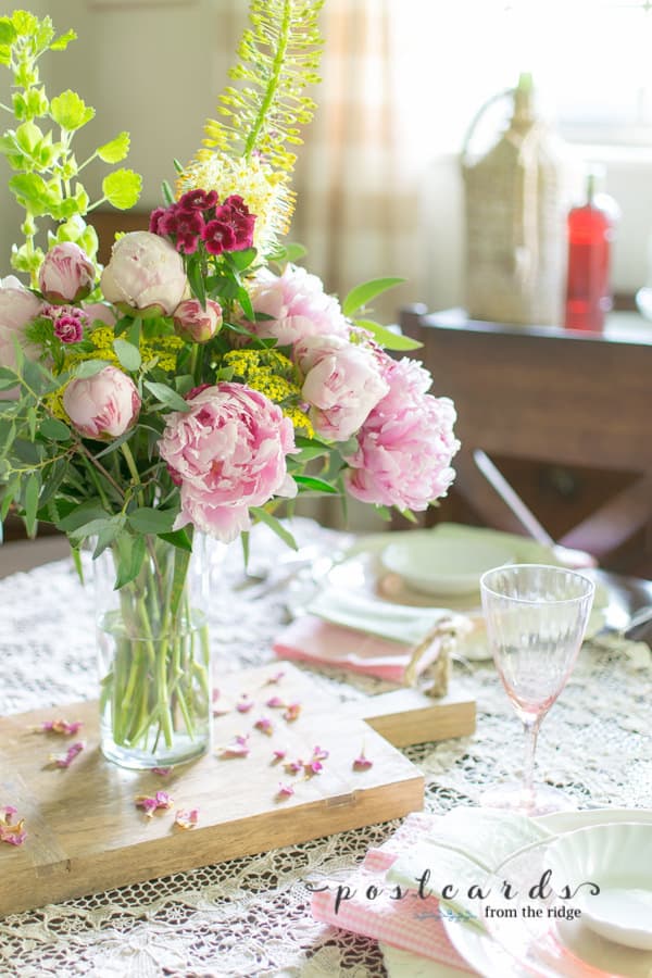 pink peony centerpiece with spring colors and vintage pink depression glass