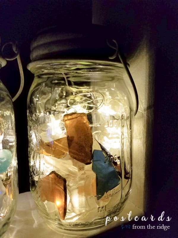 solar powered mason jar lantern made with sea glass