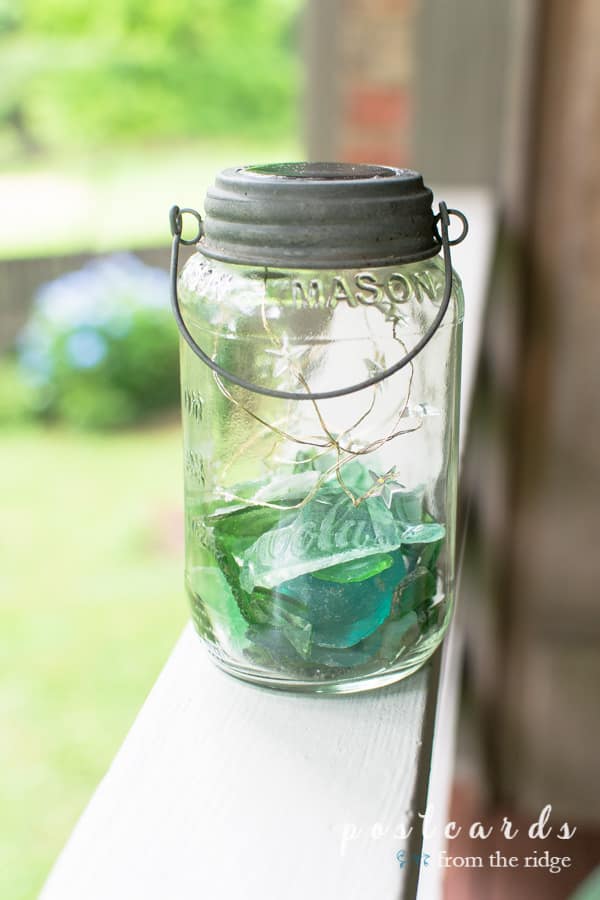 mason jar lantern with solar powered lid and sea glass