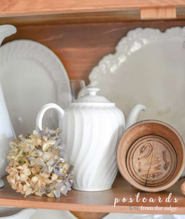 vintage white ironstone, dried hydrangeas, and wooden butter mold