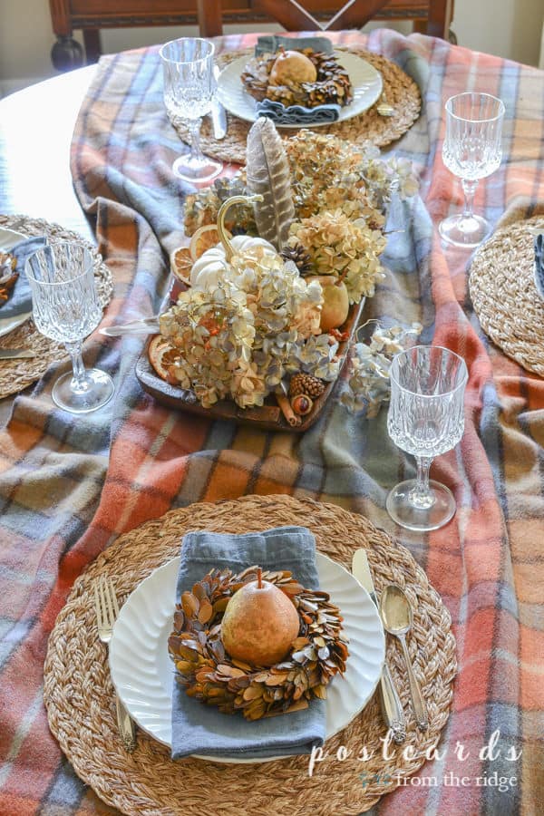 fall table with thrifted white dishes, vintage glassware, and natural elements