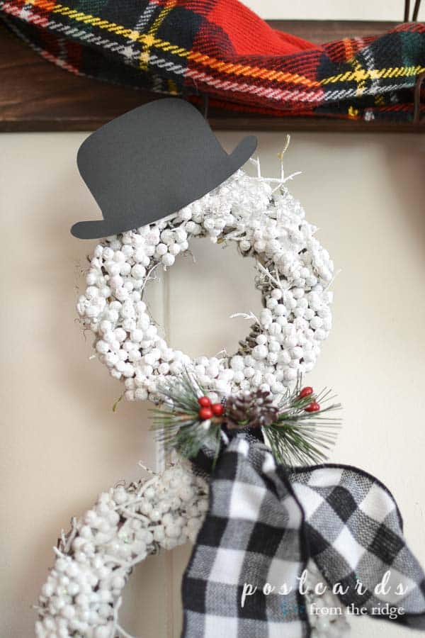 snowman wreath with glitter and paper bowler hat