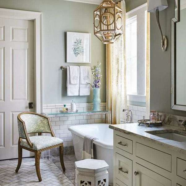 classic bathroom with Benjamin Moore Quiet Moments paint and Carrera Marble tiles