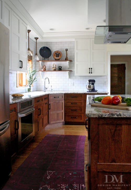 vintage style kitchen with wood and white cabinets