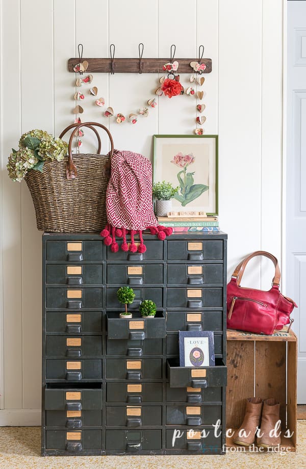 vintage metal Hobart cabinet with valentine garland and decor
