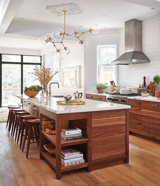 stunning kitchen with wood cabinets and large island