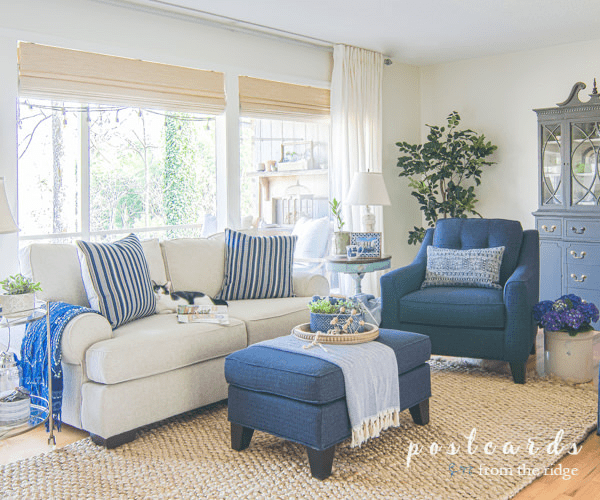 living room with blue and white furniture