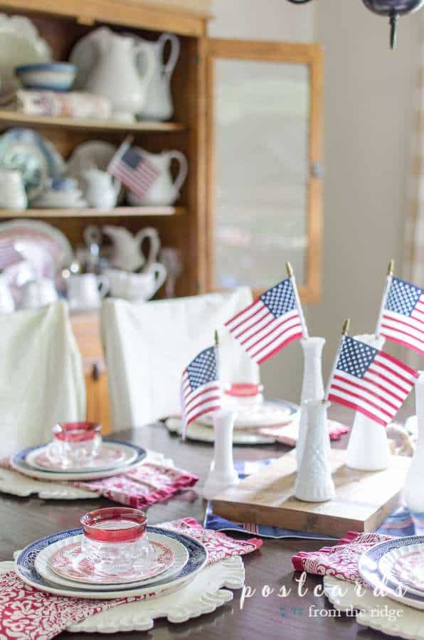 patriotic table with vintage milk glass vases and dishes