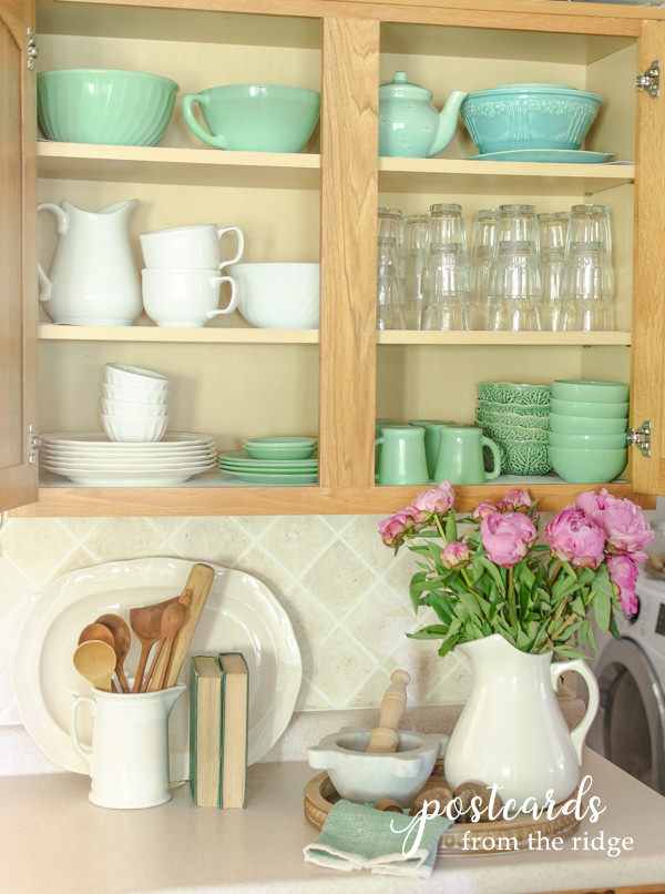 vintage jadeite and white dishes in cabinet with Duck Brand Smooth Top EasyLiner