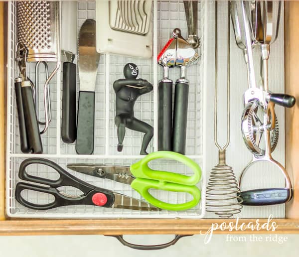 kitchen gadget drawer with white wire tray and Duck Brand Smooth Top EasyLiner