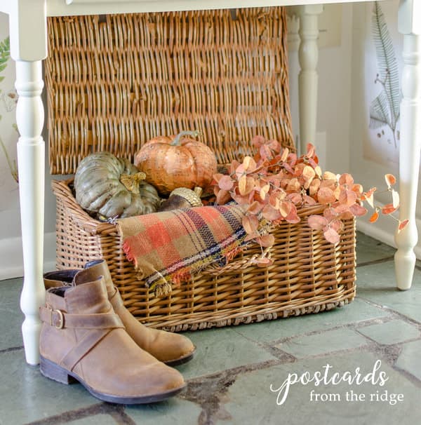 vintage french picnic hamper with fall decor and brown leather booties