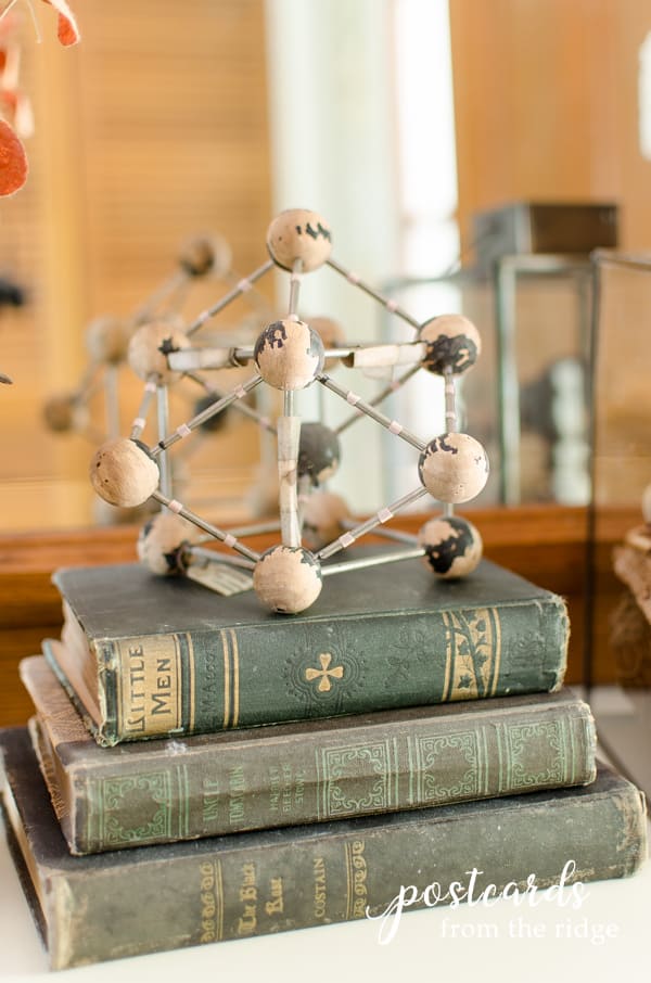 vintage books with vintage atom on top