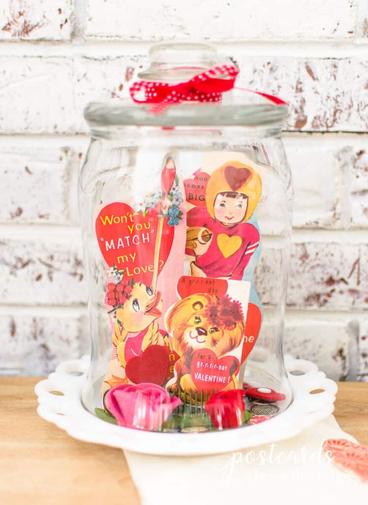 diy glass cloche with vintage valentines