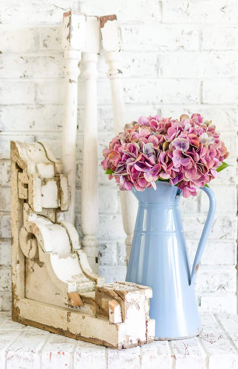 vintage pitcher and corbel with faux hydrangeas