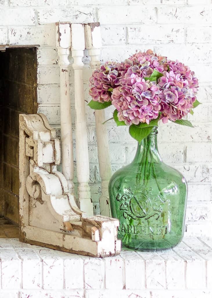 spring mantel and hearth with green and pink with vintage decor