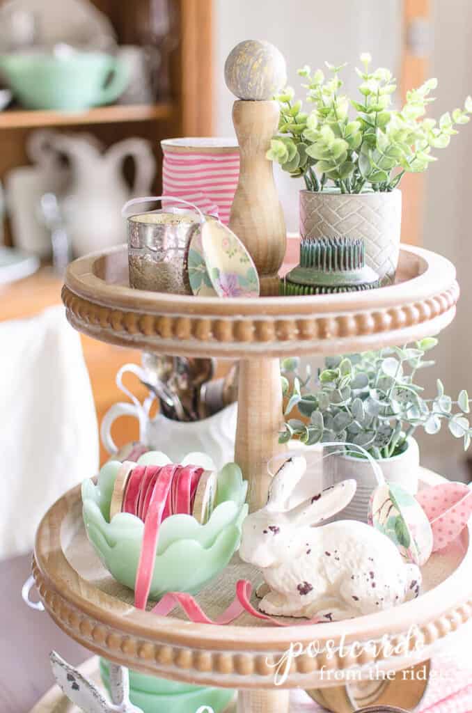 pink velvet ribbon and vintage jadeite bowls on woodent tiered tray