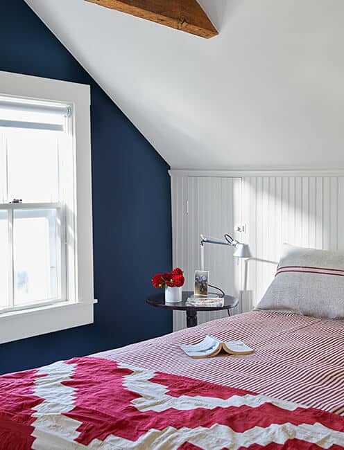 benjamin moore deep royal bedroom with red and white accents