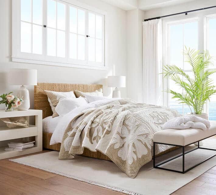 coastal grandmother style bedroom with soft bedding and textures