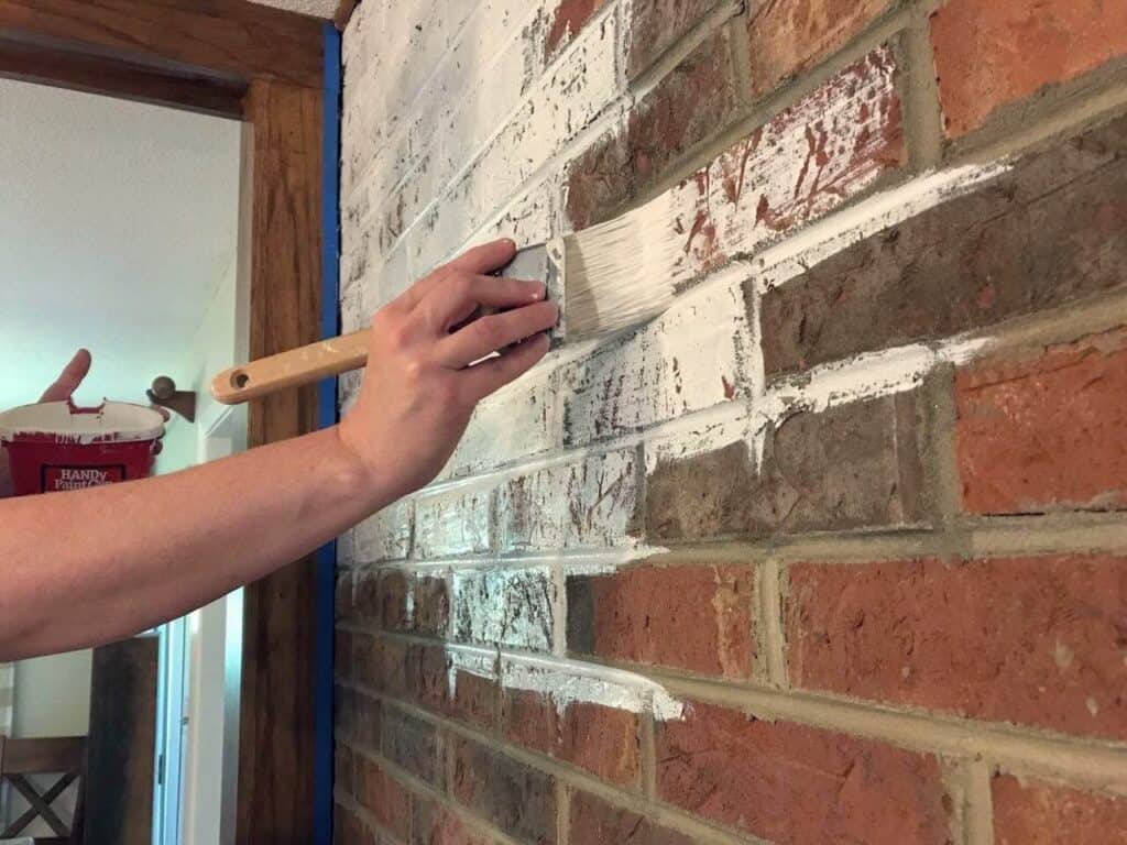 painting red brick fireplace white