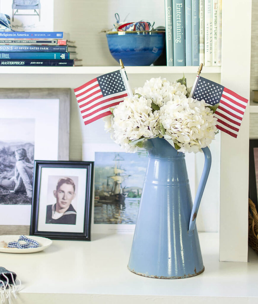 vintage enamel pitcher with white hydrangeas and American flags