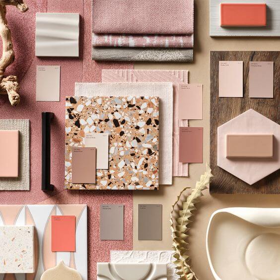 tiles and fabric samples with paint swatches in mauves and taupes