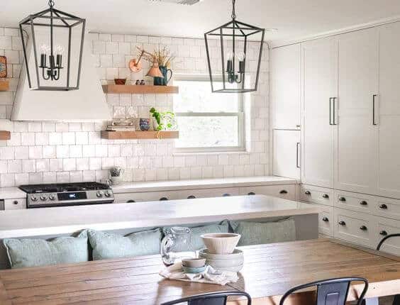 kitchen with shoji white cabinets and sw retreat island