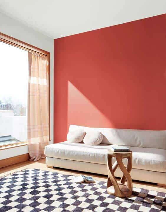 living room accent wall painted with Benjamin Moore Raspberry Blush