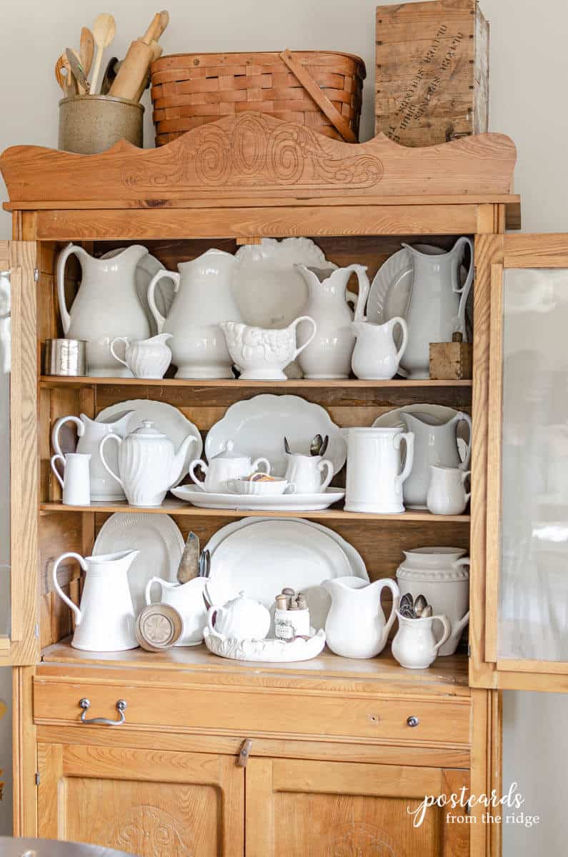 antique oak hutch with vintage white ironstone pieces