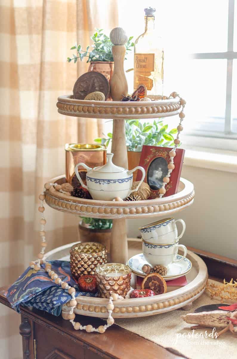 tiered tray with fall colors and decor
